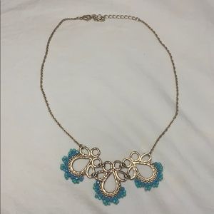 gold and blue necklace
